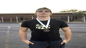 Photo Submitted New medal: Ryan Adams placed first in the 220-pound weight class after going 5-0 during the tournament. Submitted by Chad Smith 