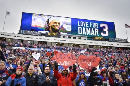 Sports teams light up their stadiums in blue & red to show support for  Damar Hamlin