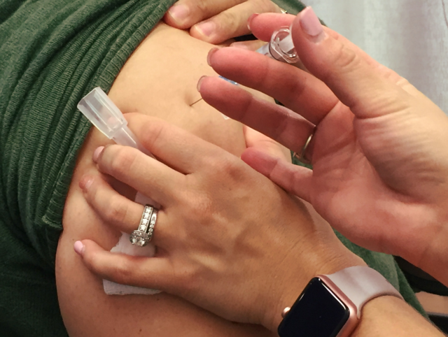 Health officials urge vaccinations amid “widespread and severe” flu activity